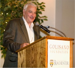 Tom Golisano speaking at a podium