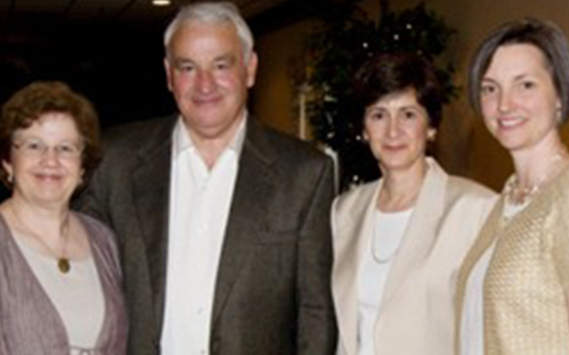 Tom Golisano, Ann Costello, and two. others pose for a photograph