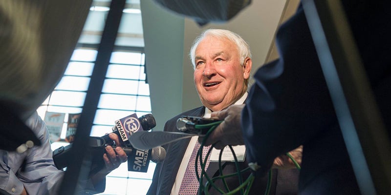 Tom Golisano being interviewed by several news stations.