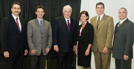 Golisano Foundation 25th Anniversary Honorees posing for a photo with tom Golisano.