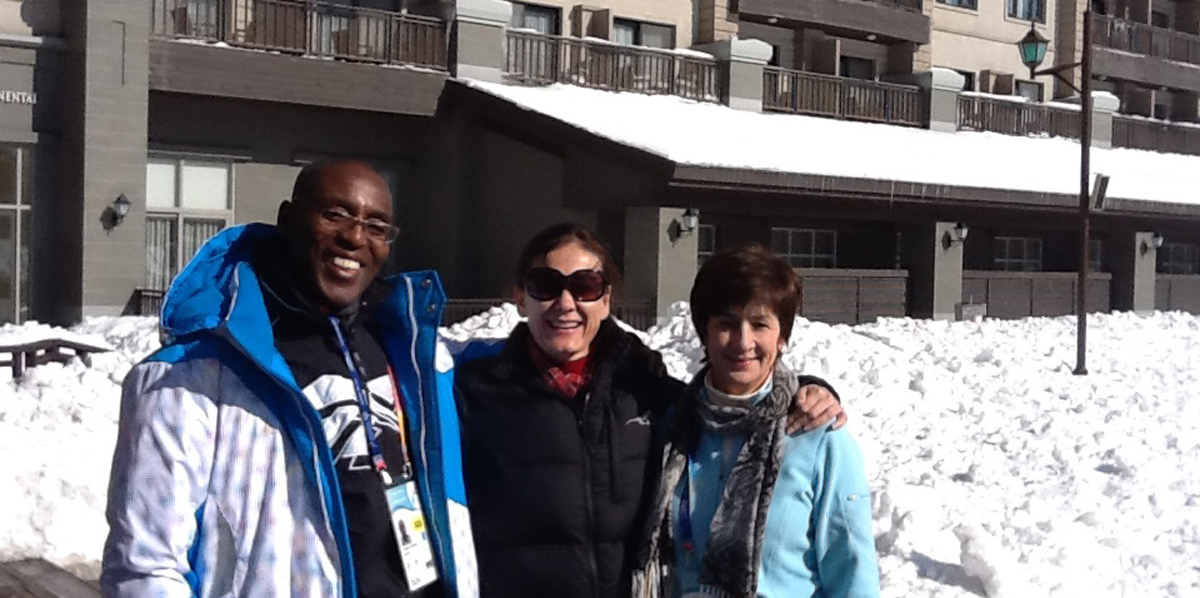 Ann Costello and two others pose outside in the winter weather at the Special Olympics in South Korea